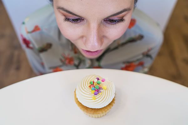 gratisography-woman-cupcake-small-thumbnail